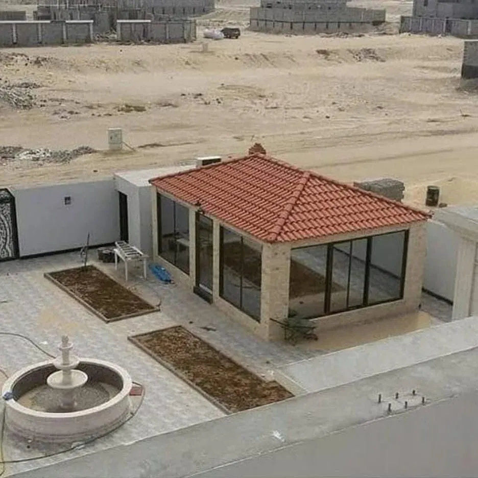 تركيب القرميد الأحمر والإسباني للمنازل والحدائق في حي الشاطئ